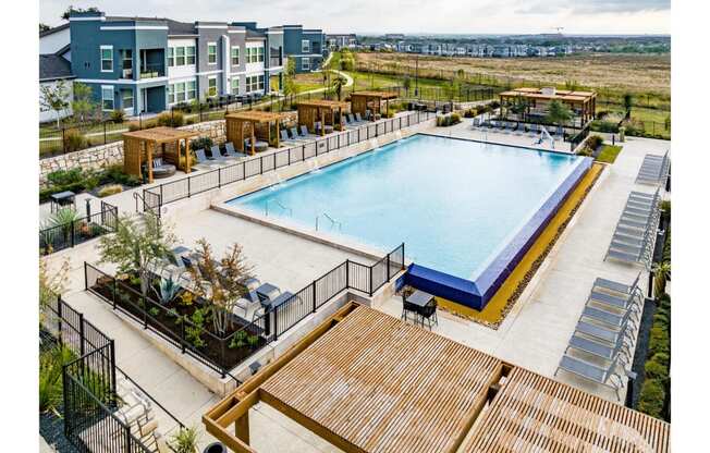 Aerial view of swimming pool at Reveal 54 Apartments