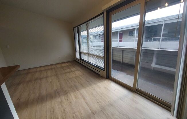 1BR Apartment with Large Patio and Rare Off-Street Parking Near Green Lake & Fremont