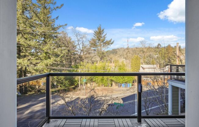 Generous Townhome, Balcony Views, Garage and Ideal Location! 2 Bed, 2.5 Bath in Hillsdale