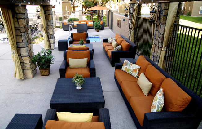 Outdoor Chairs on Poolside Sundeck at River Walk Apartments