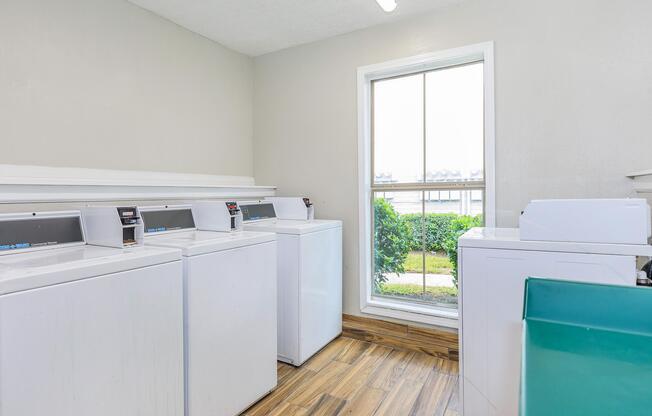 a kitchen with a sink and a refrigerator