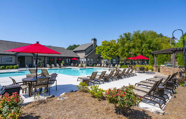 our apartments offer a swimming pool with chairs and umbrellas