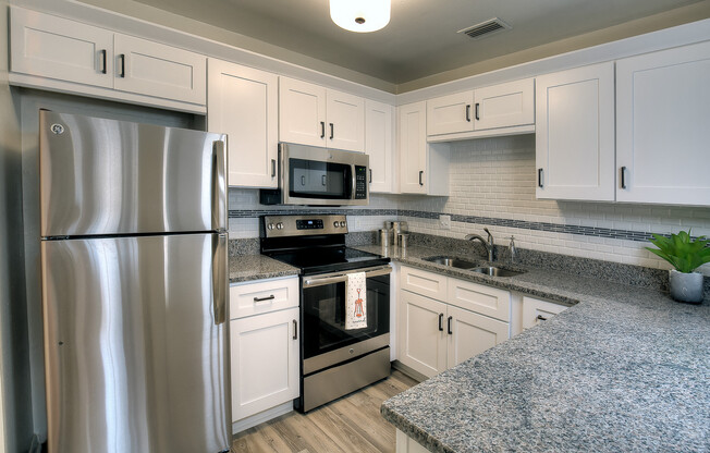 Most kitchens feature Shaker-style cabinetry, granite countertops, and stainless steel appliances.