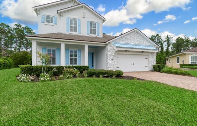 Welcome Home to this beautifully designed home located in the prestigious gated community of Coastal Oaks in Ponte Vedra