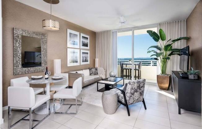 a living room with a large window and a view of the ocean at Regatta at New River, Florida