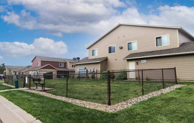 the yards are fenced off with a chain link fence