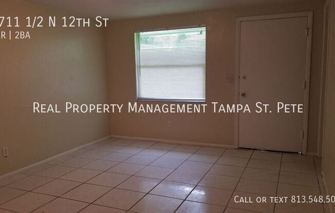 8711 1/2 N 12 ST