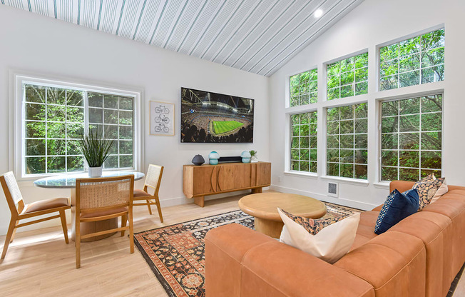 clubroom with a couch and a table with chairs