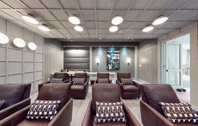 a clubhouse movie theater with comfortable seating