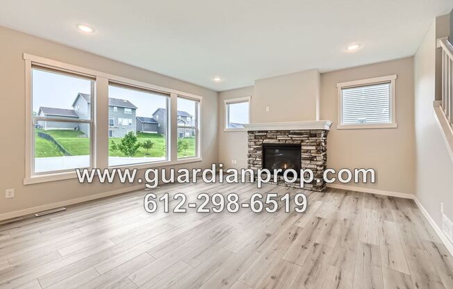 Executive Andover House Available Now, Open Floor Plan, Lower Family Room, 4 Car Garage, Fenced Yard!