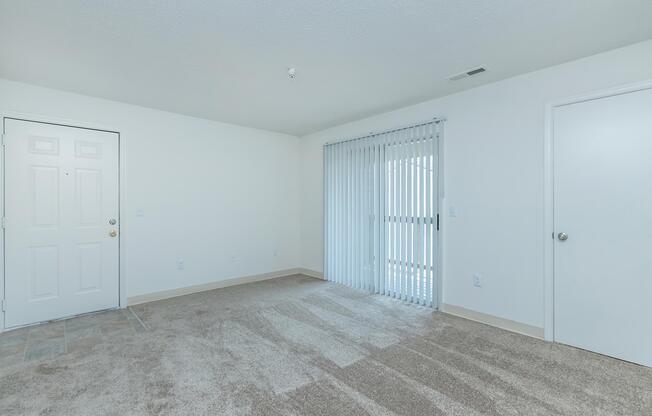 a bedroom with a bed in a room