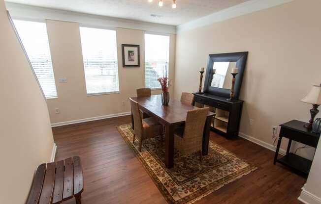 This is a photo of the dining room in the 1242 square foot, 2 bedroom, 2 and 1/2 bath Spinnaker floor plan at Nantucket Apartments in Loveland, OH.