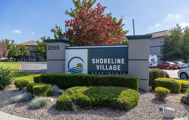 a sign for shortline village in front of a parking lot  at Shoreline Village, Richland, 99352