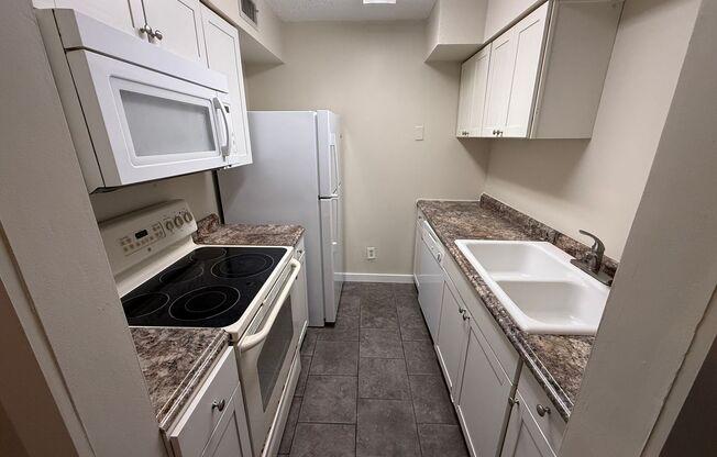 2 Bed/1 Bath, Ground Floor unit at Serravella at Spring Valley! AVAILABLE NOW!