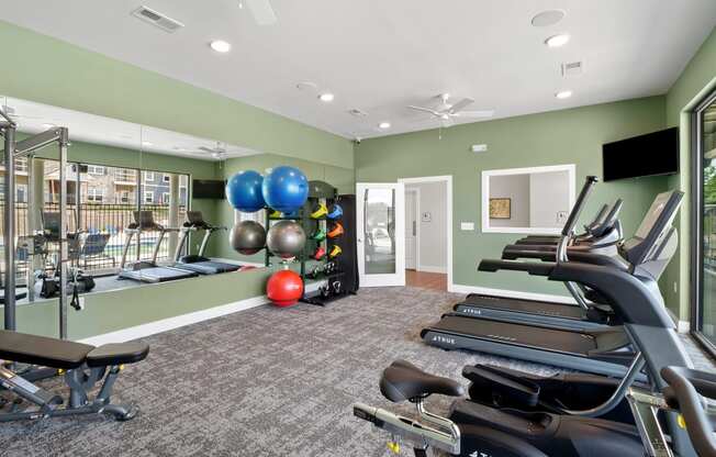 the community fitness room at the Aventura Hawk Ridge apartments, Lake St Louis, MO