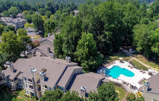 an aerial view of a house with a pool in the backyard at Hunters Chase Apartments, Midlothian, VA