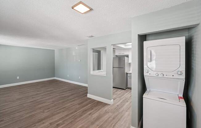 A laundry room with a washer and dryer.