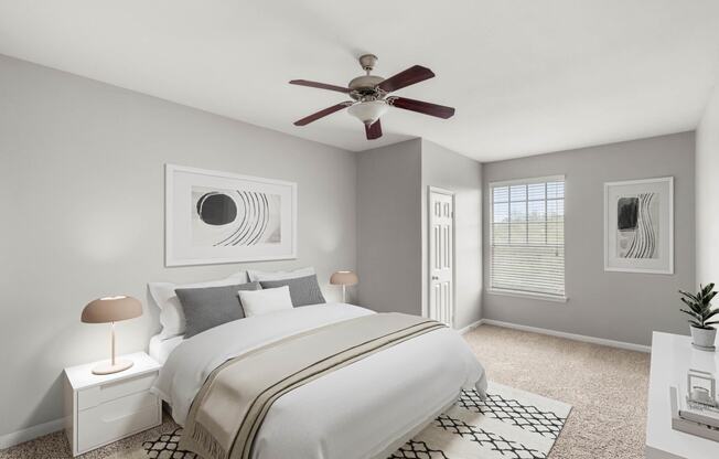 a bedroom with a large bed and a ceiling fan at Veranda at Centerfield, Texas