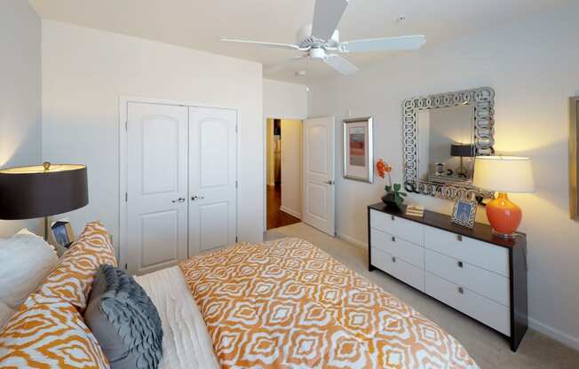 Bedroom with ceiling fan, carpet and window