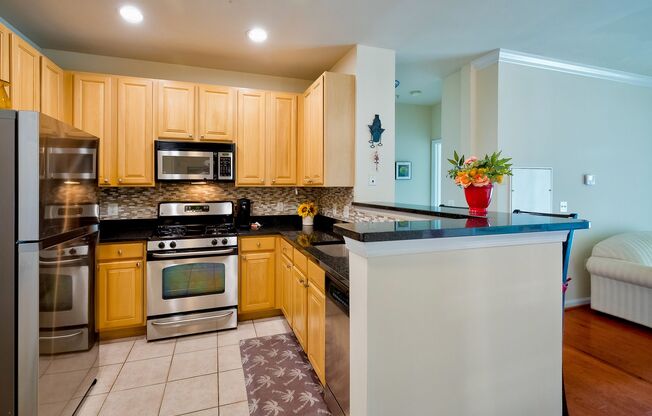 Partially Furnished Elegant 2BD Condo with Unbeatable Access & Premium Features in Arlington w/ Parking!
