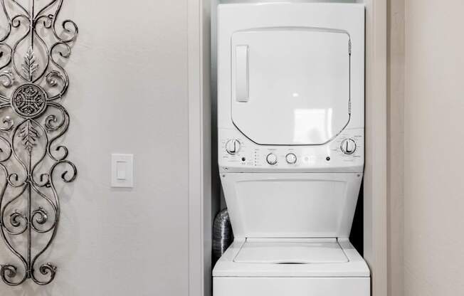 a washer and dryer in a bathroom