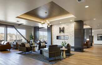 Fireplace Lounge with vaulted ceiling at Harbor Heights 55+ Community, Washington, 98501