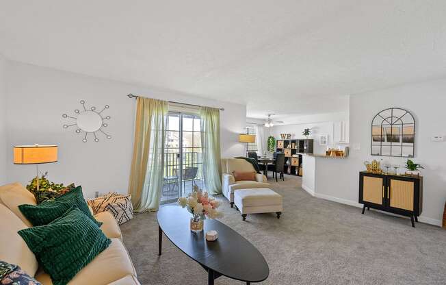 a living room with couches and a coffee table