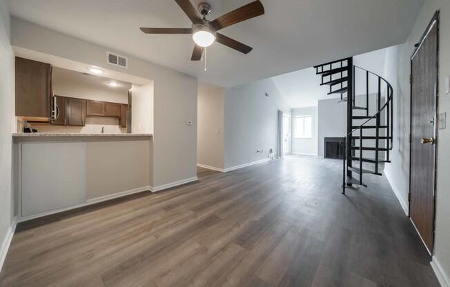 Dining area and staircase at Alpine Slopes Apartments near Grand Rapids, MI