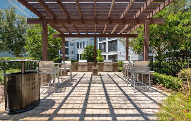 Outdoor patio with grills | Village at Terra Bella