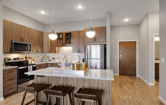 Bright kitchen at Nuvelo at Parkside Apartments in Apple Valley