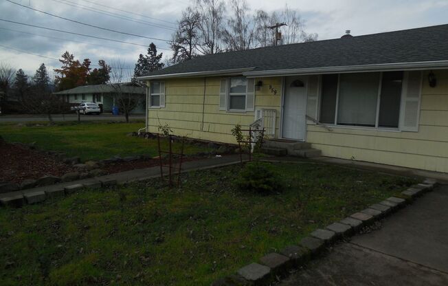 3 Bedroom Home w/ Bonus Room and Partially Fenced Yard ~ 959 W 1st