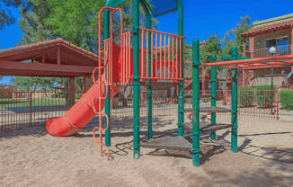 Outdoor Playground equipped with a slide, monkey bars, and latter