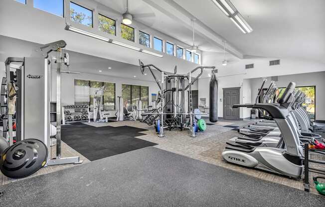 the gym is equipped with treadmills and other exercise equipment  at Sunset Ridge, San Antonio, TX