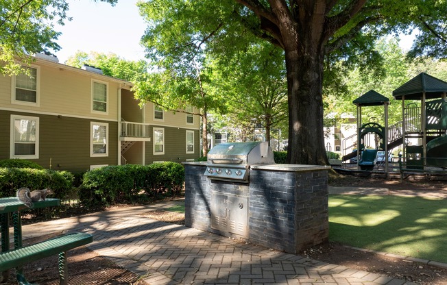 Lake House at Martin's Landing | Roswell, GA | Grilling Station by Playground