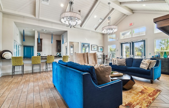 Furnished clubroom with sofas and tables
