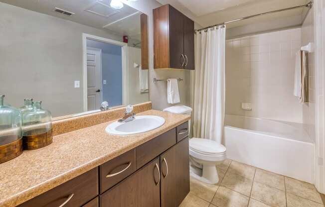 Courtney Station Apartments - Ceramic tile flooring in bathrooms