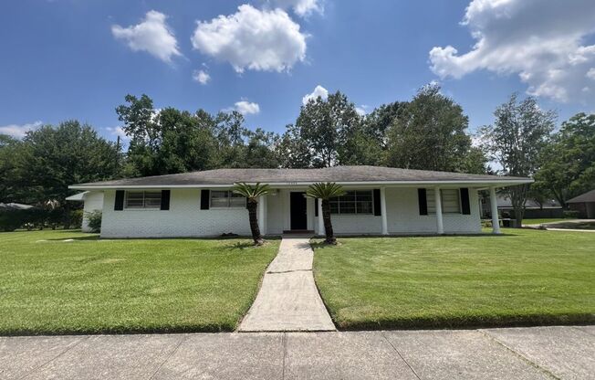 Welcome to 10444 Browning Dr. in the sought-after Broadmoor neighborhood!