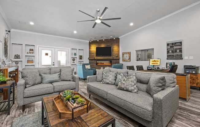 a living room with couches and a coffee table