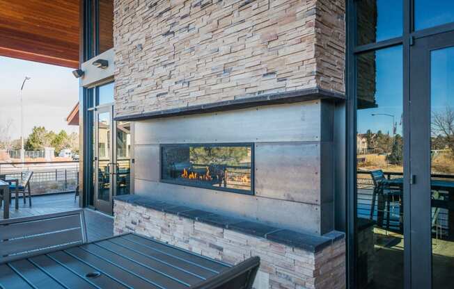 Outdoor Fireplace at Apres Apartments in Aurora, CO