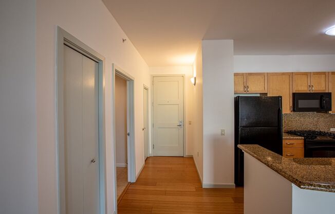 Sweet + secure 1/1 condo with parking, extra storage room + AC available now!