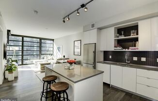 River-View 2BD Luxury Condo with Balcony and Parking!