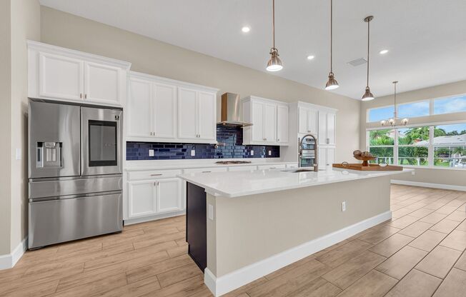 4 Bedroom 3.5 Bath Waterfront  Pool Home in Gated Community