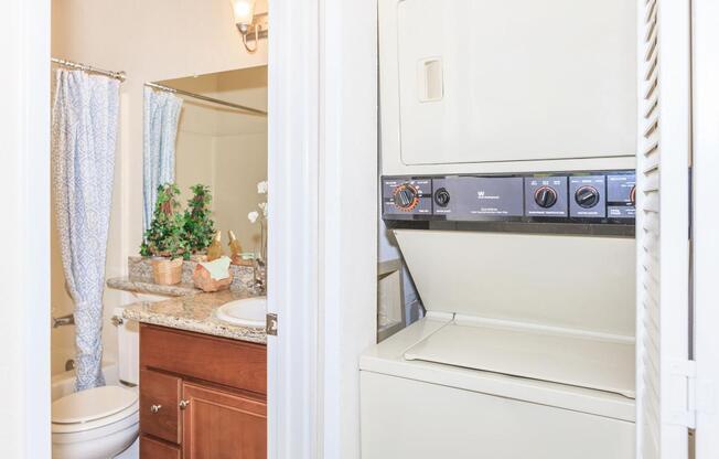 a white refrigerator freezer sitting inside of a kitchen