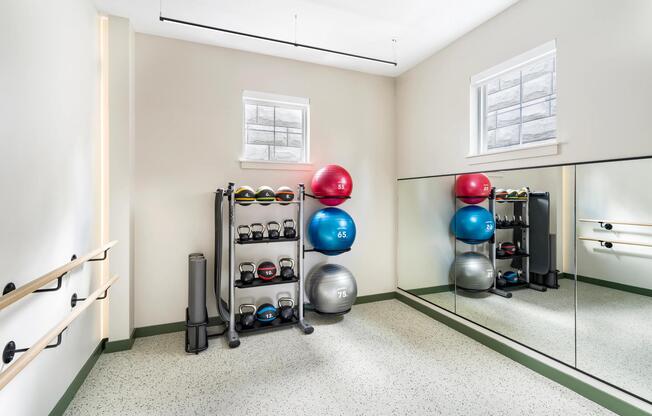 This light-filled studio is perfect for stretching, yoga, or low-impact movement—complete with medicine balls, kettlebells, and mounted ballet barres.