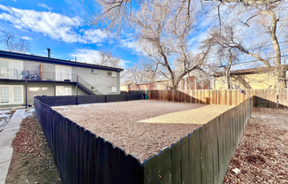 Experience outdoor living at its best with this charming duplex and spacious yard.