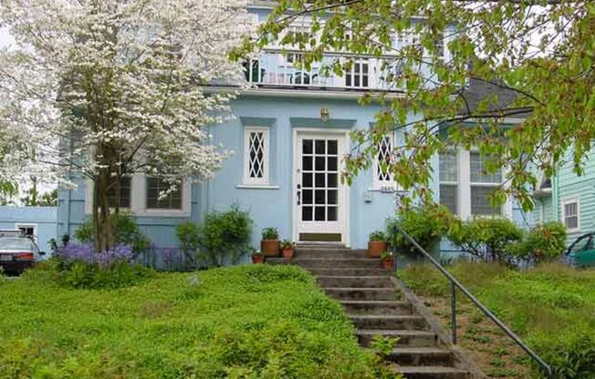 1929 Fairy Tale Tri-plex on a cherry lined NW neighborhood street