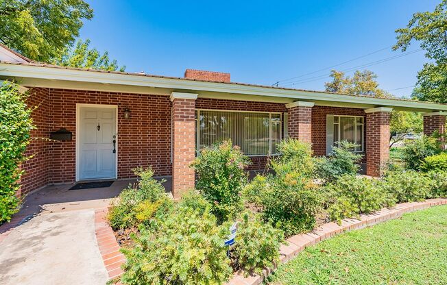 Classic Red Brick Beauty in Prestigious North Central Park