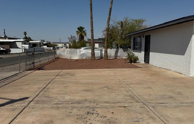 2BR Remodeled and Updated, Large cement parking, 3 Car Garage and fenced yard