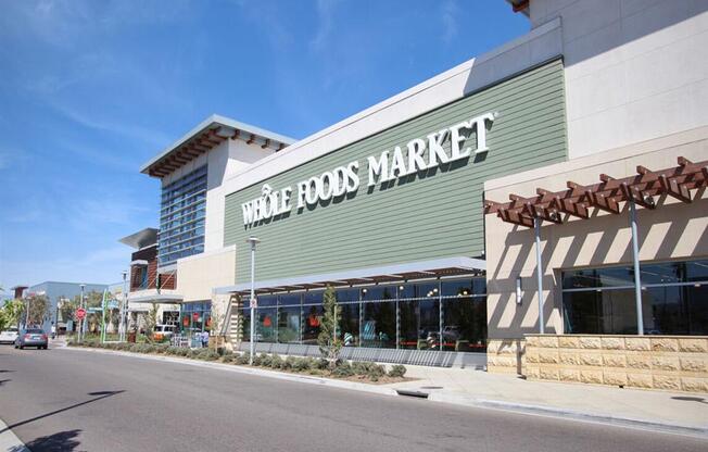 a store front of a market with a street in front of it at The Vines at Riverpark, LLC, Oxnard, CA 93036