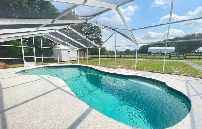 Gorgeous 4 BR country estate home with pool on 3 Acres